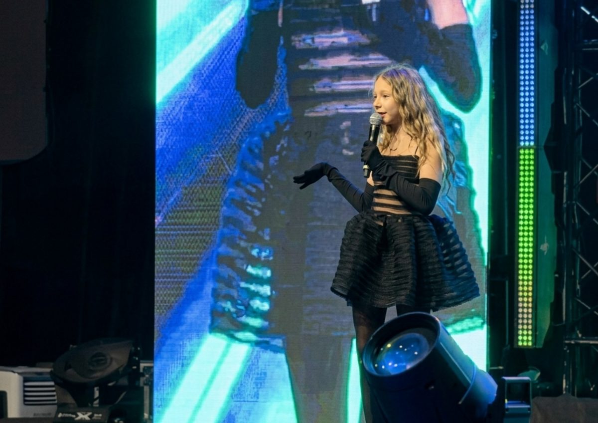 Young creator performing live on stage at MOTN